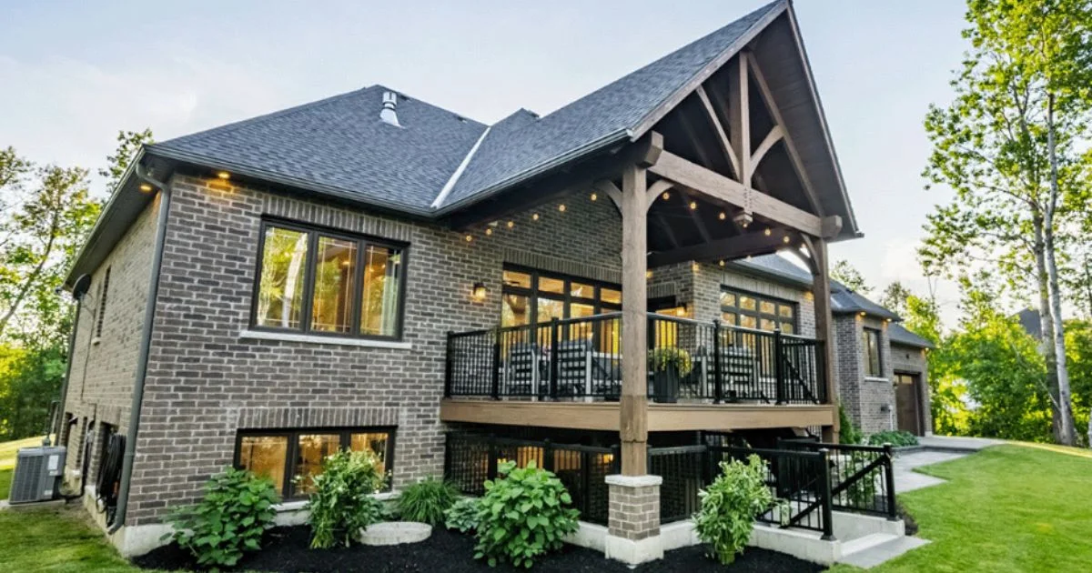 Custom home with timber frame covered deck